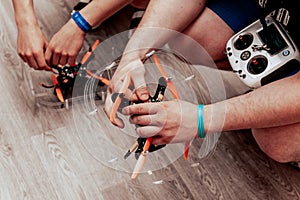 Drone Operator Controls Flying Quadcopter, Modern Remote Technology autonomous