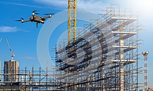 ..Drone over construction site. video surveillance or industrial inspection