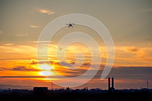 Drone over the Village at cloudy Sunset