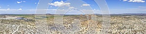 Drone panorama of the landscape around the famous Vingerklip rock needle in northern Namibia during the day