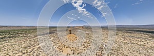 Drone panorama of the landscape around the famous Vingerklip rock needle in northern Namibia during the day