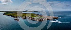 Drone panorama landscape of Broadhaven Bay and the hsitoric Broadhaven Lighthouse on Gubbacashel Point photo