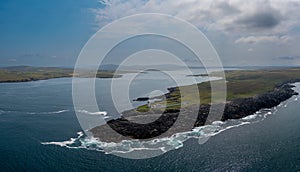 Drone panorama landscape of Broadhaven Bay and the hsitoric Broadhaven Lighthouse on Gubbacashel Point photo
