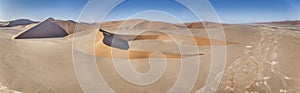 Drone panorama over the Sossusvlei and the surrounding dunes of the Namib Desert in Namibia during the day