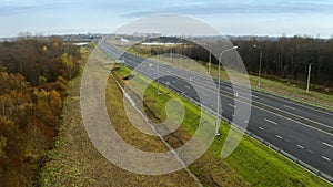 Drone perspective of highway life: cars on the move