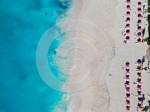 Drone photo of beach with red umbrellas in Grace Bay, Providenciales, Turks and Caicos photo