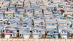 Drone photo of a community in Oakley, California with houses, cars, streets and solar