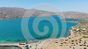 Old mills in Elounda, Crete from above. Panoramic view with drone photo