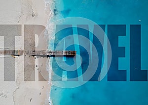 Drone photo of pier in Grace Bay, Providenciales, Turks and Caicos. Text overlay says travel