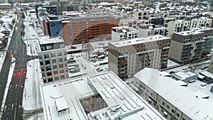 Drone photography multistory houses in a city during winter day