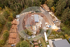 Drone photography of small lumberyard during autumn day