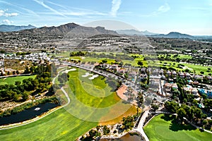 Drone point of view golf course during sunny summer day