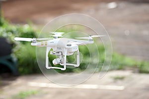 Drone quad copter with high resolution digital camera on the sky photo
