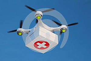 Drone quadcopter carrying first aid kit for fast emergency medical care.