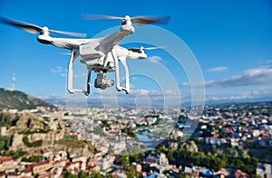 Drone quadcopter with digital camera photo