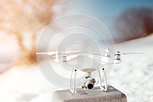 Drone quadcopter ready for flying. Flying drones in winter concept. Hobby uav ready for connection