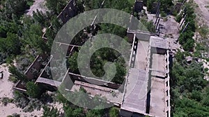 Drone quadrocopter explores an abandoned industrial building.