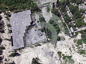 Drone quadrocopter explores an abandoned industrial building.