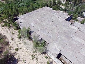 Drone quadrocopter explores an abandoned industrial building.