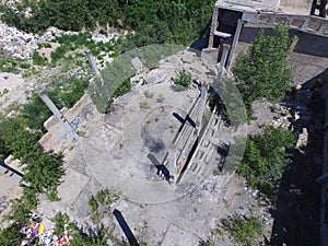 Drone quadrocopter explores an abandoned industrial building.