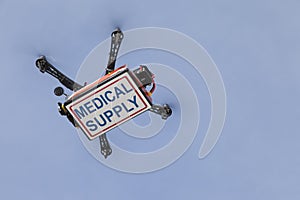 Drone quadrocopter transporting case with medical supplies