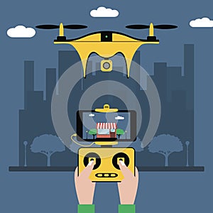 Drone and remote control. Hands hold a radio controller with screen to quadcopter flying over city. Quadricopter with a camera.