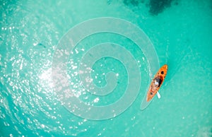 Drone\'s Eye View: Unrecognizable Man Canoeing in a Tropical Exotic Destination