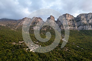 Drone scenery mikro Papingo village , Zagorochoria area, Epirus, Ioannina Greece. Astraka tower rocky cliffs above the