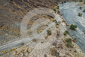 Drone shot of a 4x4 car in the wadi