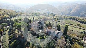 Drone shot, aerial view of Umbria, Tuscany in Italy. Sunrise with fog in early morning.