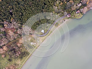 Drone shot of the Chapel of Our Lady of Victories and the Furnas` Lagoon