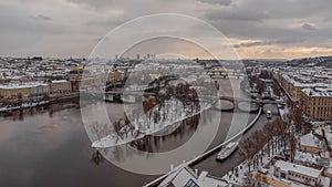 Drone shot of the Charles Bridge in Prague, Czech Republic, during wintertime