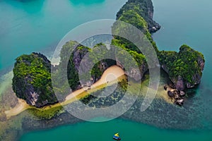 Drone shot of a limestone island which is located in Lan Ha Bay, Vietnam.