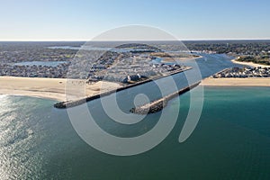 Drone shot of the Manasquan Inlet in New Jersey on a bright sunny day