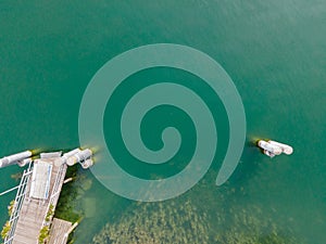 Drone shot over water. Background of lake. Birds view. Copy Space