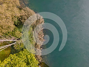 Drone shot over water. Background of lake. Birds view. Copy Space