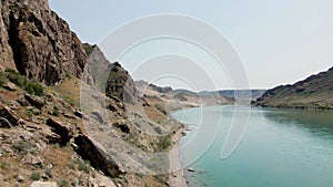 Drone shot of river Ili and spring steppe in Kazakhstan