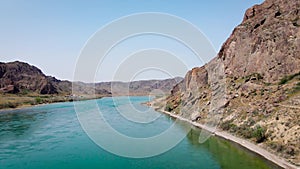 Drone shot of river Ili and spring steppe in Kazakhstan