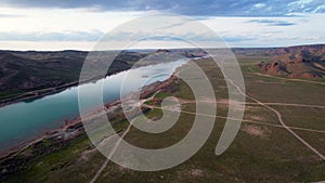 Drone shot of river Ili and spring steppe in Kazakhstan