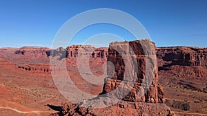 Drone shot of rocky formations in different canyons at sunrise