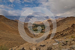 Drone shot of the rocky hills of Khardung la in Ladakh, India photo