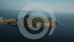 Drone shot of Seongsan Ilchulbong in Jeju Island, Republic of Korea.