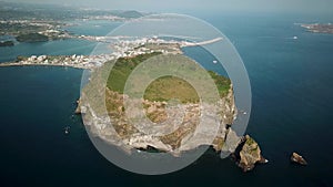 Drone shot of Seongsan Ilchulbong in Jeju Island, Republic of Korea.