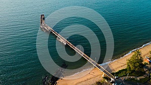 Drone shot of warf at the beach