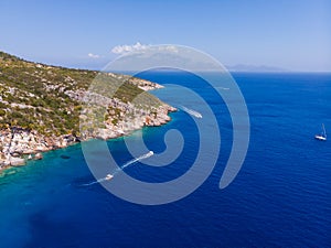 Drone shot of Zakynthos island with beautiful turquoise Ionian sea and limestone cliffs near famous Navagio beach during daytime