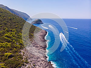 Drone shot of Zakynthos island with beautiful turquoise Ionian sea and limestone cliffs near famous Navagio beach during daytime