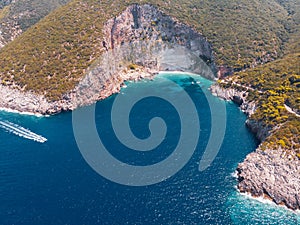 Drone shot of Zakynthos island with beautiful turquoise Ionian sea and limestone cliffs near famous Navagio beach during daytime