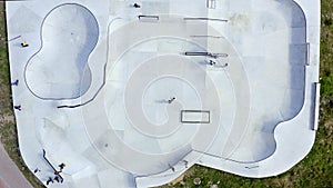 Drone, skatepark and people on landscape outdoor, exercise and action sports. Aerial view, urban park and skateboard for