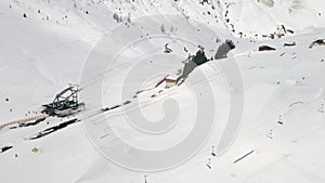 Drone, ski and lift on mountain range with snow in Switzerland for travel, adventure or holiday. Swiss alps, gandola and