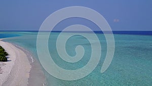 Drone sky of marine coast beach voyage by aqua blue lagoon with white sandy background
